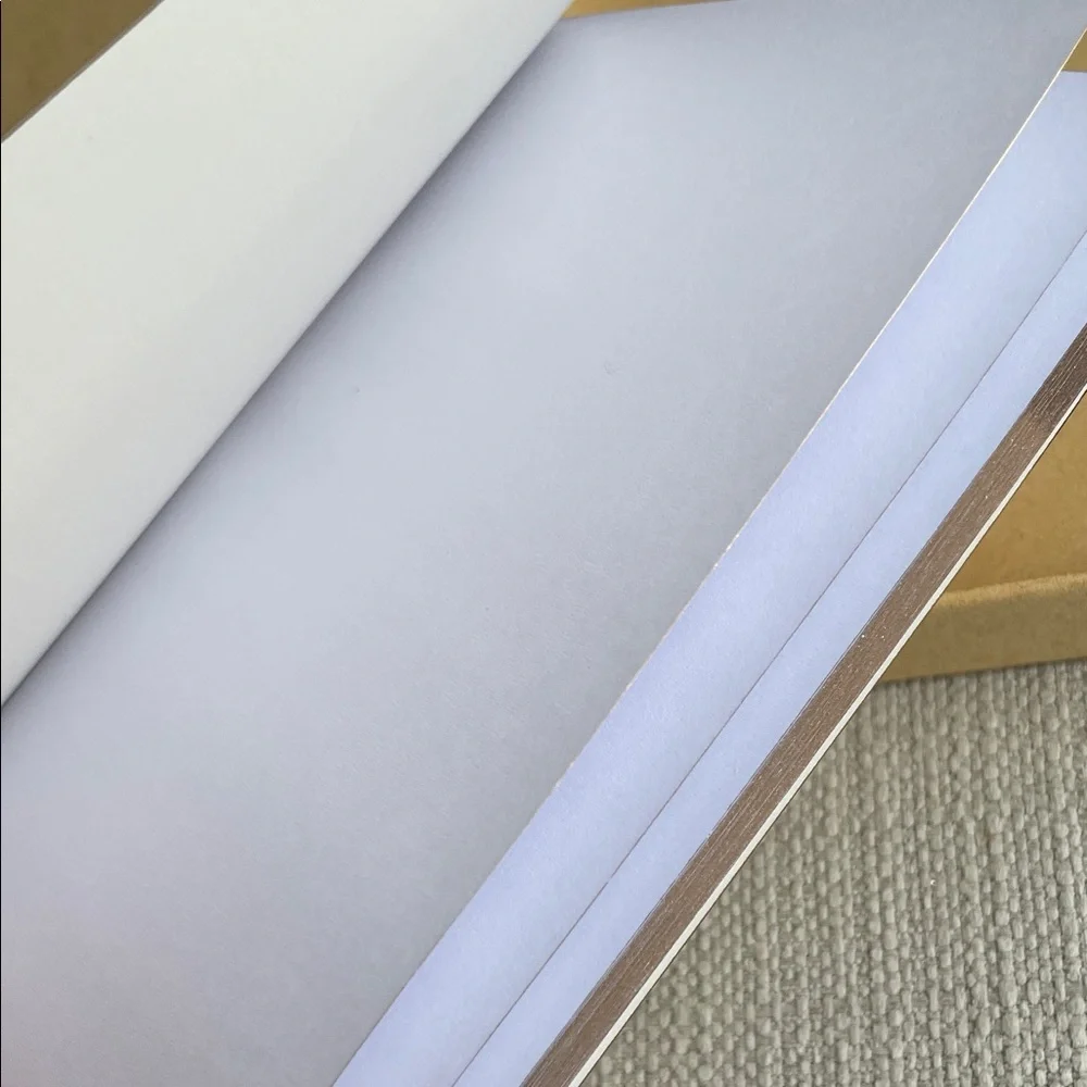 Sezane La Magie Cream Notebook in box